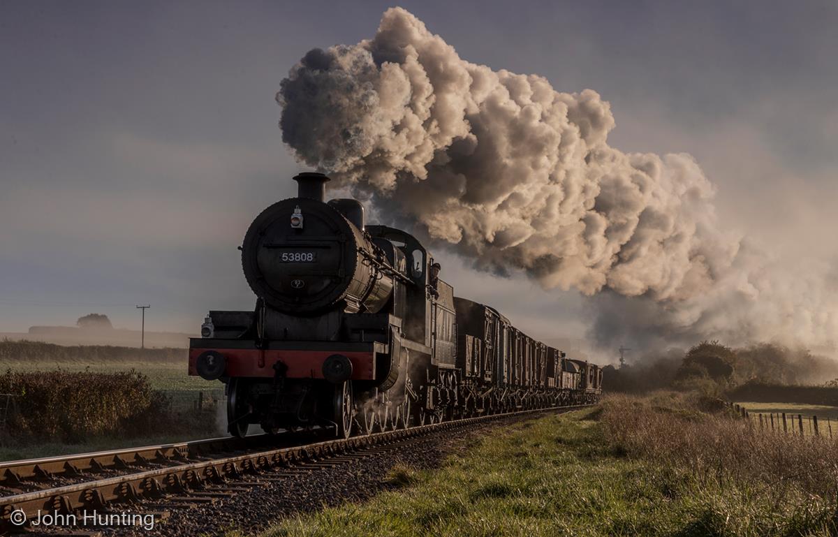 Early Morning Freight Train by John Hunting